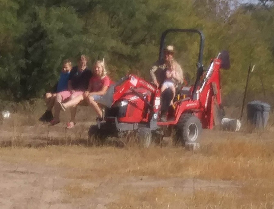 Taking the grandkids for a ride on my favorite toy!