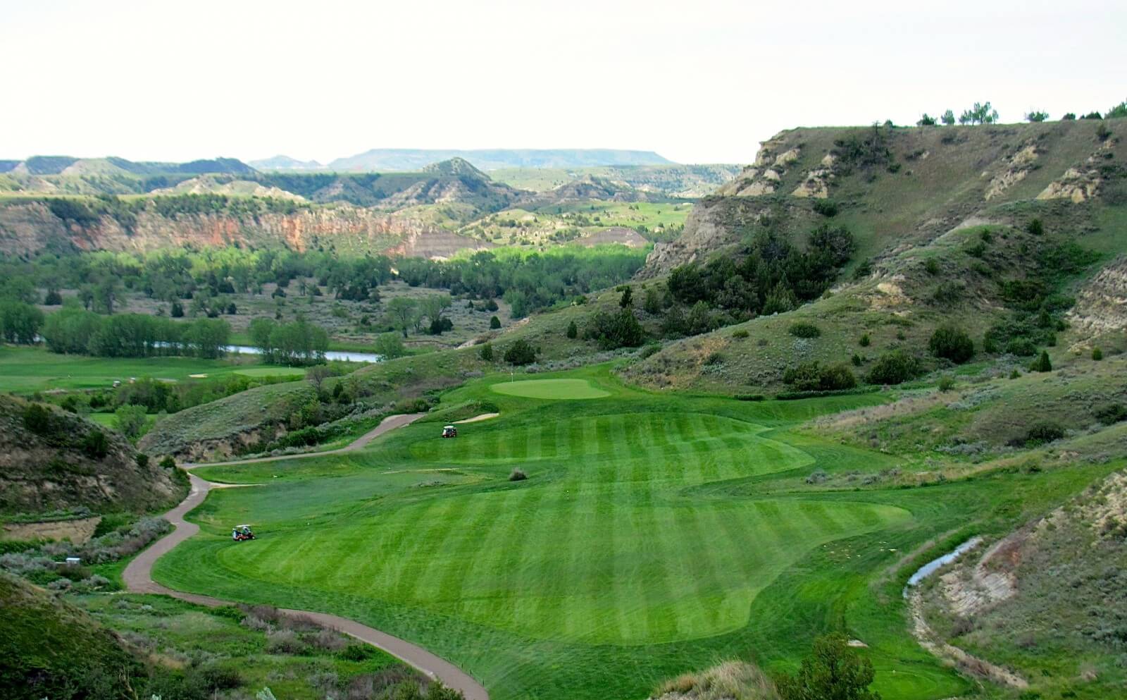 TEEING  OFF  AT  "BULLY PULPIT GOLF COURSE"   MADORA, NORTH DAKOTA