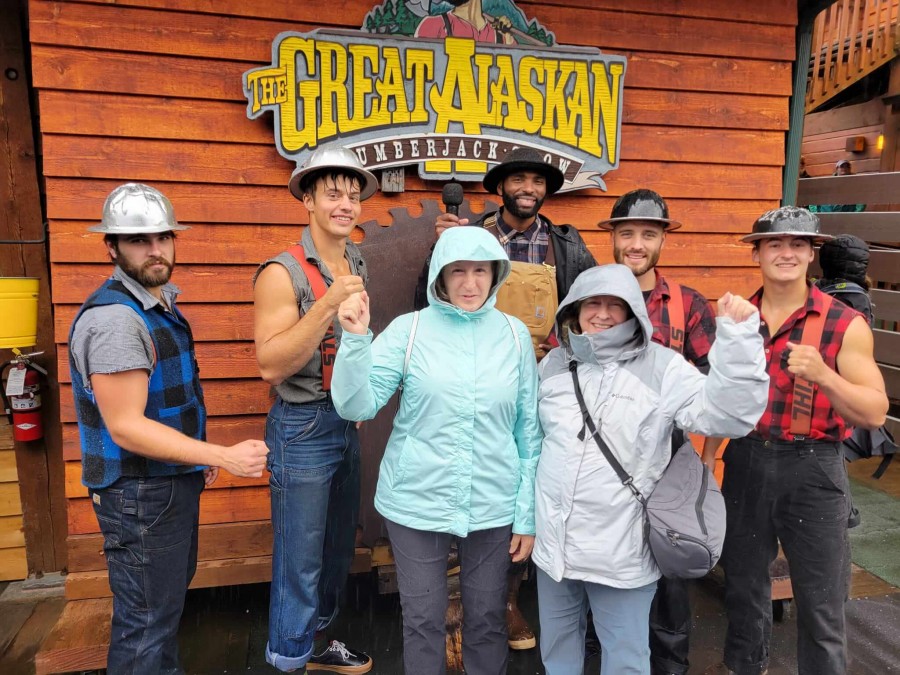 My sister and I in Ketchikan, Alaska at a Lumberjack show in Aug 2022.  I'm in the light blue jacket.