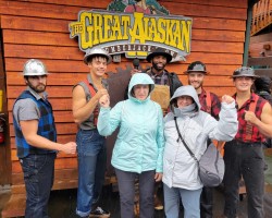 My sister and I in Ketchikan, Alaska at a Lumberjack show in Aug 2022.  I'm in the light blue jacket.