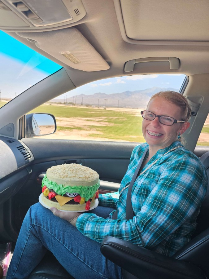 My youngest daughter, Janelle Casey, with one of her custom cakes!