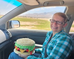 My youngest daughter, Janelle Casey, with one of her custom cakes!