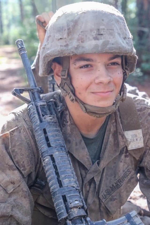Grandson Mathew.  About 1/2 way through the USMC Crucible.  This is the family smile.  Bemused and confident, it says “I got this, I’m the rock”.  It’s subdued so as not to let others know where the mind is at.